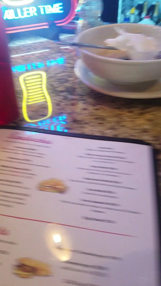 Casual cafe tables with simple breakfast plates.
